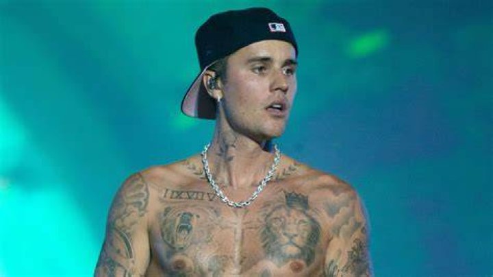 Unveiling The Enchanting Artistry Of Justin Bieber's Rose Tattoo